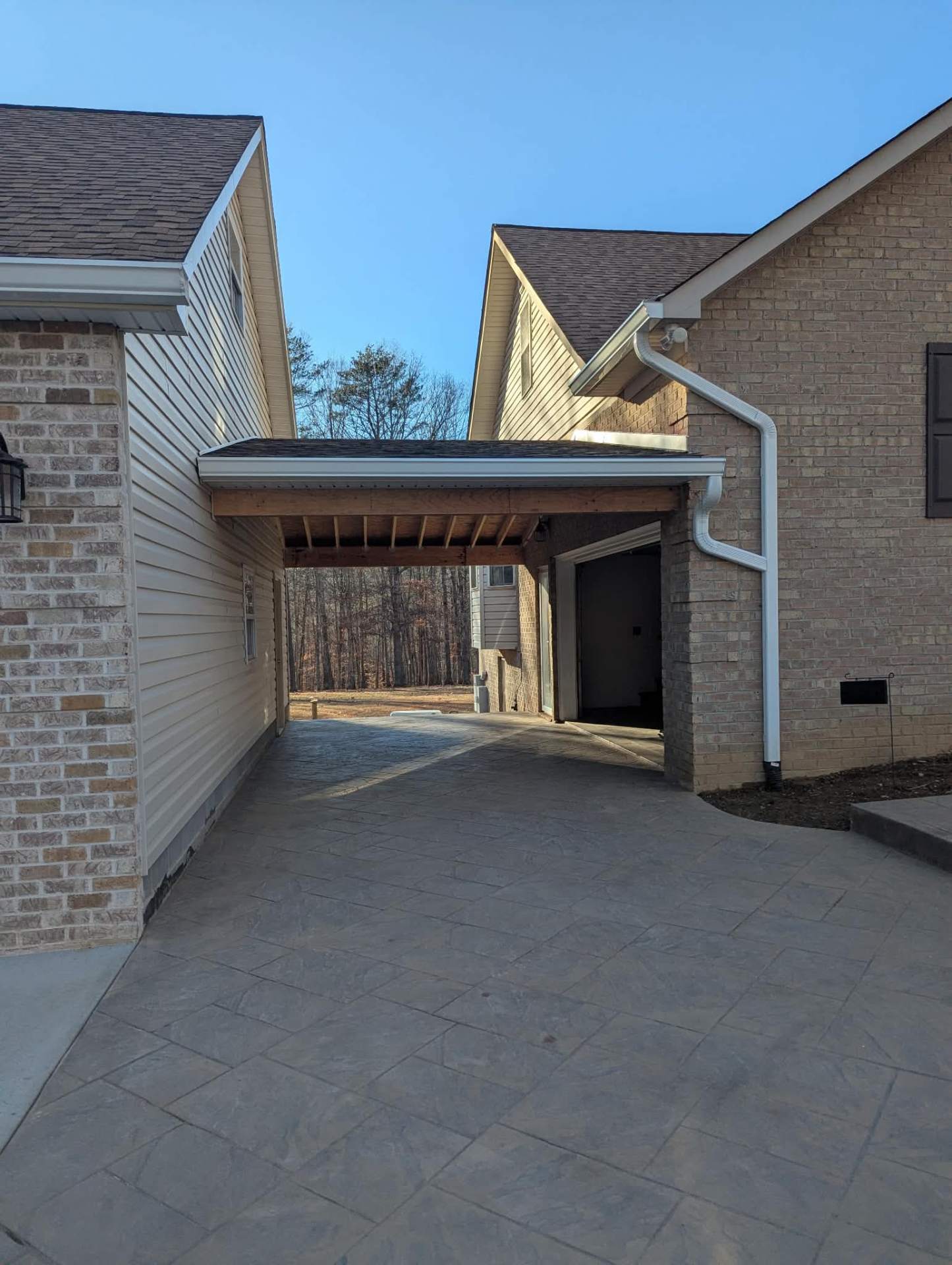 Stamped breezeway between two homes