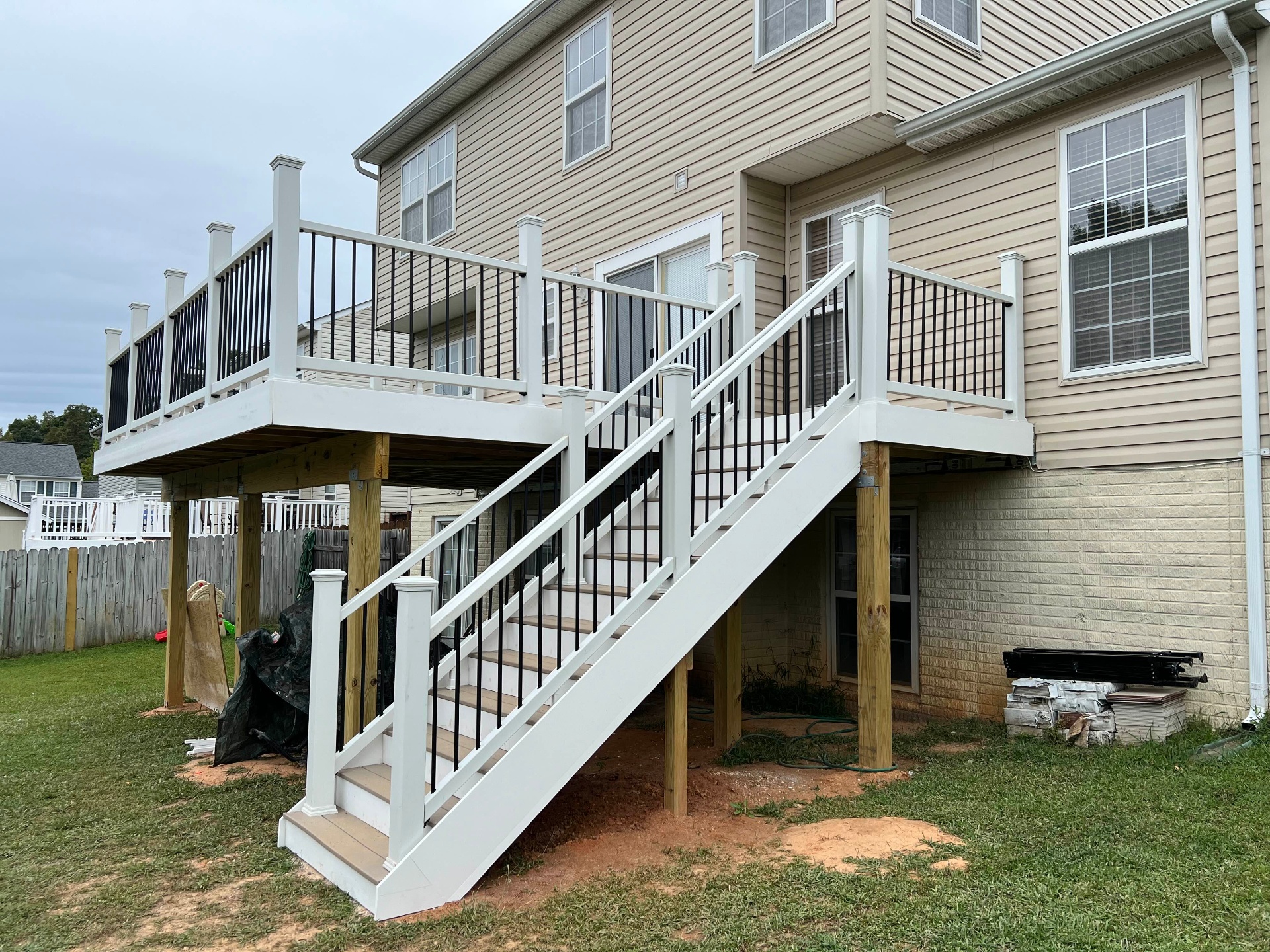 Two-story elevated deck with iron balusters